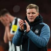 Newcastle United head coach Eddie Howe applauds fans at the end of the game.