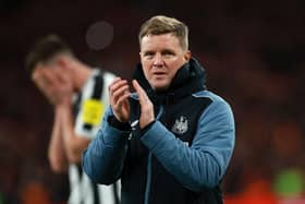 Newcastle United head coach Eddie Howe applauds fans at the end of the game.