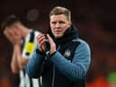 Newcastle United head coach Eddie Howe applauds fans at the end of the game.