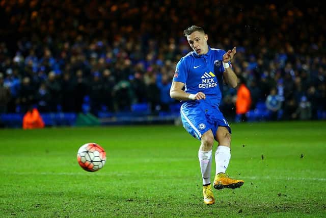 PETERBOROUGH, ENGLAND - FEBRUARY 10: Marcus Maddison of Peterborough scores his penalty during the penalty shootout in the Emirates FA Cup fourth round replay match between Peterborough United and West Bromwich Albion at ABAX Stadium on February 10, 2016 in Peterborough, England. (Photo by Richard Heathcote/Getty Images)