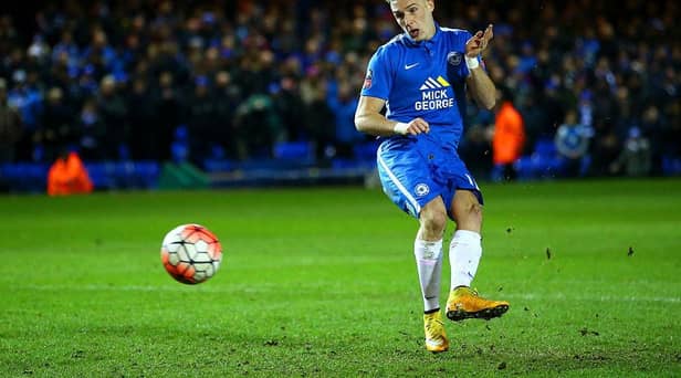 PETERBOROUGH, ENGLAND - FEBRUARY 10:  Marcus Maddison of Peterborough scores his penalty during the penalty shootout in the Emirates FA Cup fourth round replay match between Peterborough United and West Bromwich Albion at ABAX Stadium on February 10, 2016 in Peterborough, England.  (Photo by Richard Heathcote/Getty Images)