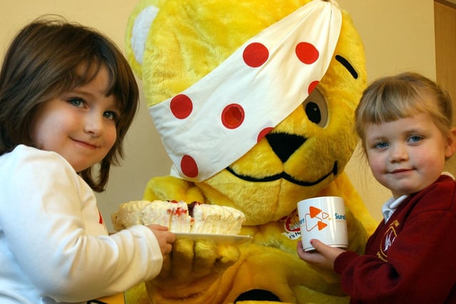 Pudsey Bear was a very welcome visitor to the SureStart Primrose Parent and Toddler Group in 2004. He was served refreshments by Laura Boak and Anna Scott.