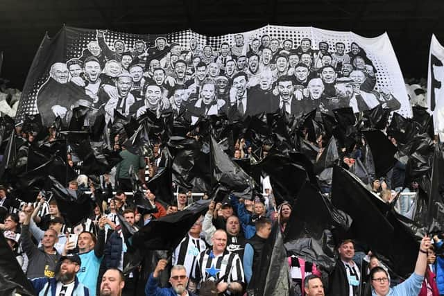 Newcastle United fans display a giant flag last season.