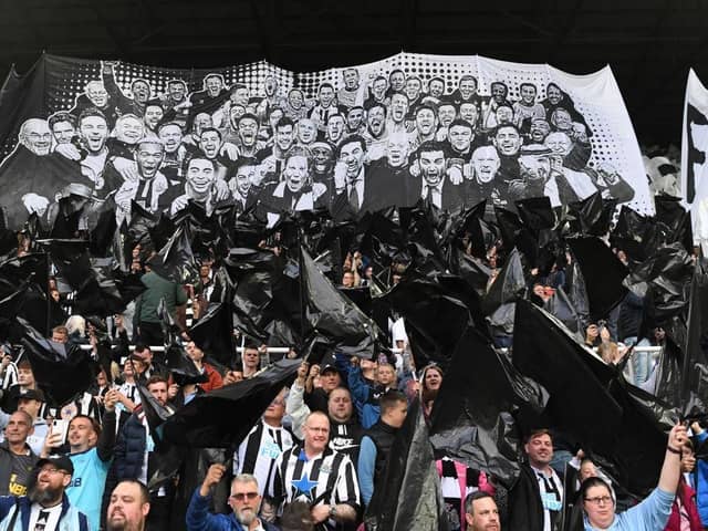 Newcastle United fans display a giant flag last season.