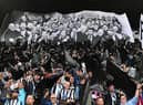 Newcastle United fans display a giant flag last season.
