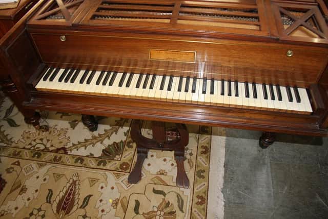 This 1820s piano was another find.