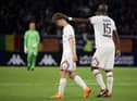 Paris Saint-Germain's French defender Edouard Michut (L) leaves the pitch after receiving a red card during the French L1 football match between Angers SCO and Paris Saint-Germain at the Raymond-Kopa Stadium in Angers, north-western France on April 20, 2022. (Photo by LOIC VENANCE / AFP) (Photo by LOIC VENANCE/AFP via Getty Images)