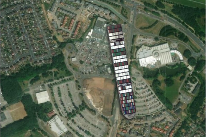 The Ever Given would dwarf The Dome (right) and the Asda supermarket (left).