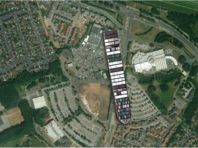The Ever Given would dwarf The Dome (right) and the Asda supermarket (left).