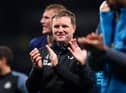 Newcastle United head coach Eddie Howe applauds the club's fans.