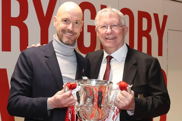 Manager Erik ten Hag and Sir Alex Ferguson of Manchester United celebrate in the dressing room after the Carabao Cup Final match between Manchester United and Newcastle United at Wembley Stadium on February 26, 2023 in London, England. (Photo by Matthew Peters/Manchester United via Getty Images)