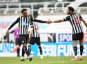 Newcastle United's English midfielder Joe Willock (L) celebrates scoring his team's second goal with Newcastle United's Brazilian striker Joelinton (R) during the English Premier League football match between Newcastle United and Tottenham Hotspur at St James' Park in Newcastle-upon-Tyne, north east England on April 4, 2021.