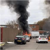 Emergency services were called to deal with an incident involving two cars on fire in Mitre Place.