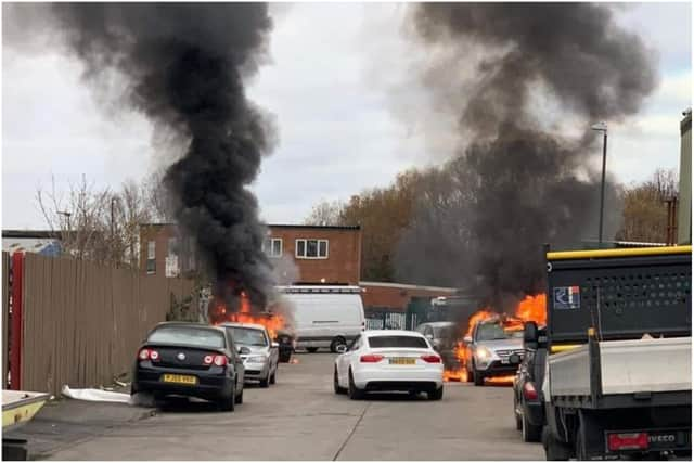 Emergency services were called to deal with an incident involving two cars on fire in Mitre Place.