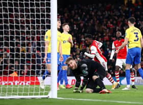 Eddie Nketiah of Arsenal scores their team's fourth goal and his hat-trick past Lee Burge of Sunderland. (Photo by Ryan Pierse/Getty Images)