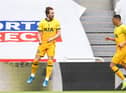Tottenham's Harry Kane celebrates scoring against Newcastle.