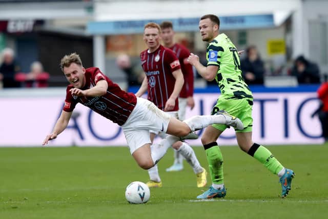 South Shields' Martin Smith (left) is fouled by Forest Green Rovers' Armani Little during the Emirates FA Cup first round match at the 1st Cloud Arena, South Shields.