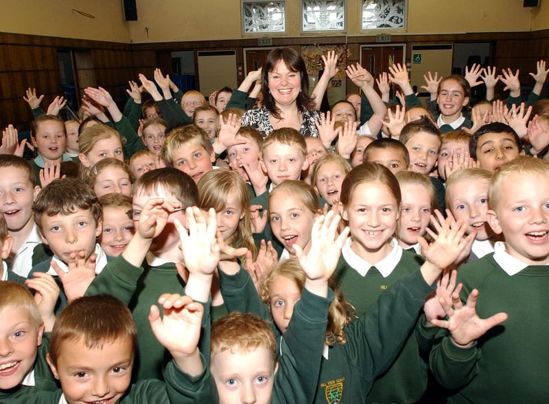 A 2006 singing lesson at Hill View. Can you spot someone you know?