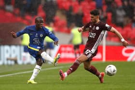 LONDON, ENGLAND - MAY 15: N'Golo Kante of Chelsea passes past Ayoze Perez of Leicester City  during The Emirates FA Cup Final match between Chelsea and Leicester City at Wembley Stadium on May 15, 2021 in London, England. A limited number of around 21,000 fans, subject to a negative lateral flow test, will be allowed inside Wembley Stadium to watch this year's FA Cup Final as part of a pilot event to trial the return of large crowds to UK venues. (Photo by Matt Childs - Pool/Getty Images)