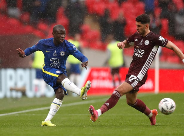 LONDON, ENGLAND - MAY 15: N'Golo Kante of Chelsea passes past Ayoze Perez of Leicester City  during The Emirates FA Cup Final match between Chelsea and Leicester City at Wembley Stadium on May 15, 2021 in London, England. A limited number of around 21,000 fans, subject to a negative lateral flow test, will be allowed inside Wembley Stadium to watch this year's FA Cup Final as part of a pilot event to trial the return of large crowds to UK venues. (Photo by Matt Childs - Pool/Getty Images)
