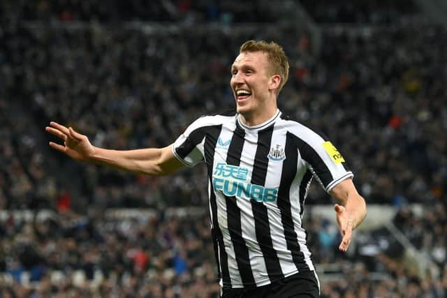 Newcastle player Dan Burn celebrates after scoring the opening goal during the Carabao Cup Quarter Final match between Newcastle United and Leicester City at St James' Park on January 10, 2023 in Newcastle upon Tyne, England. (Photo by Stu Forster/Getty Images)