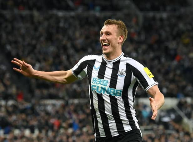 Newcastle player Dan Burn celebrates after scoring the opening goal during the Carabao Cup Quarter Final match between Newcastle United and Leicester City at St James' Park on January 10, 2023 in Newcastle upon Tyne, England. (Photo by Stu Forster/Getty Images)