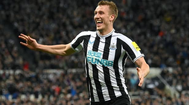 Newcastle player Dan Burn celebrates after scoring the opening goal during the Carabao Cup Quarter Final match between Newcastle United and Leicester City at St James' Park on January 10, 2023 in Newcastle upon Tyne, England. (Photo by Stu Forster/Getty Images)