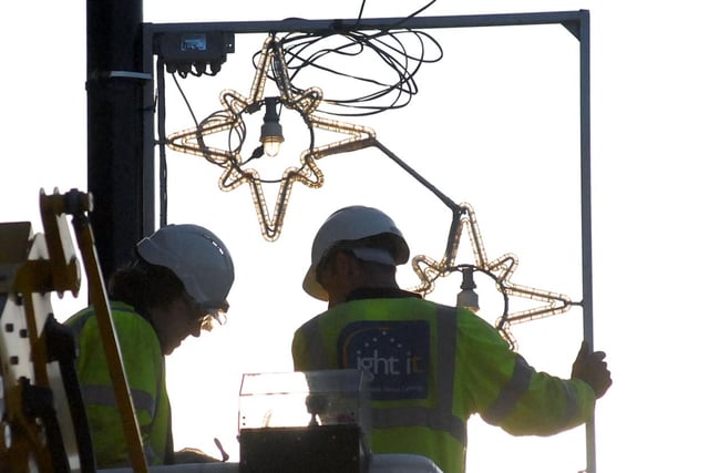 The first Christmas lights go up in 2007 in a gloriously warm October night in South Shields.