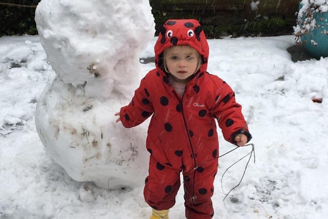 Adorable little girl out in the snow. By @adzgreen721.