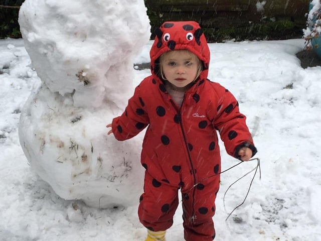 Adorable little girl out in the snow. By @adzgreen721.