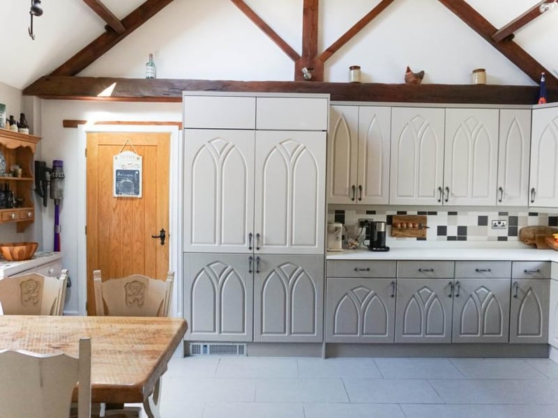 Breakfast kitchen with an array of integrated appliances and fitted wall and base units