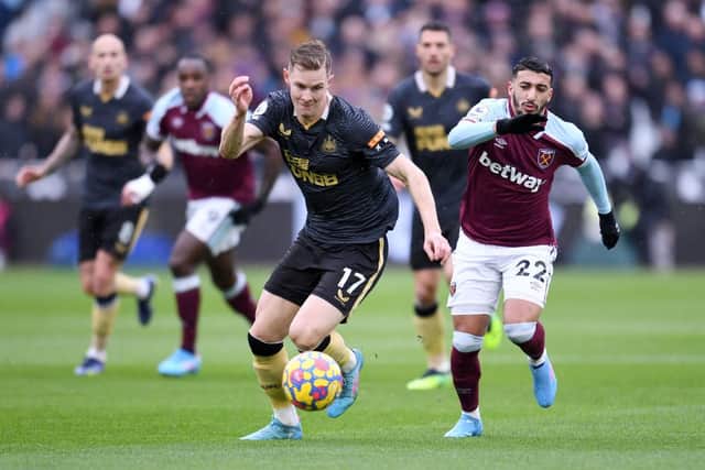Emil Krafth of Newcastle United battles for possession with Said Benrahma of West Ham United during the Premier League match between West Ham United and Newcastle United at London Stadium on February 19, 2022 in London, England. (Photo by Alex Burstow/Getty Images)