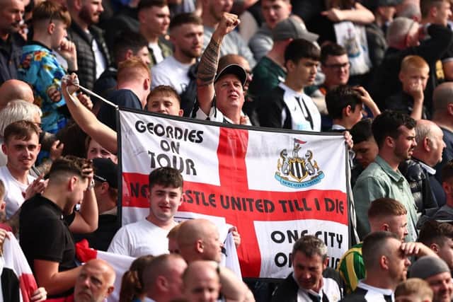 The Newcastle United away end certainly enjoyed their day out at Carrow Road (Photo by Marc Atkins/Getty Images)