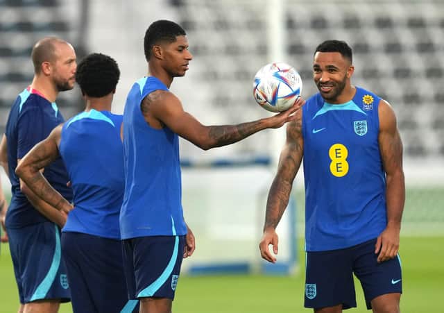 England's Marcus Rashford and Callum Wilson during a training session in Qatar.