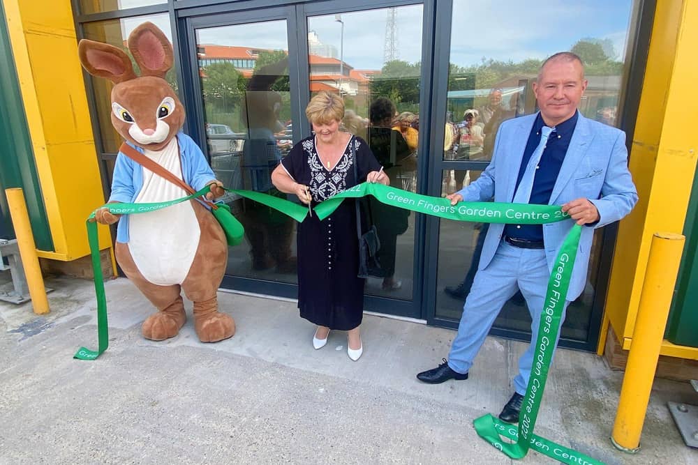 Leader of South Tyneside Council Councillor Tracey Dixo,, centre, cutting the ribbon to open Green Fingers Garden Centre.