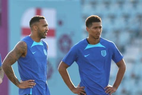 Callum Wilson alongside Jude Bellingham whilst on England duty in Qatar (Photo by Alex Pantling/Getty Images)
