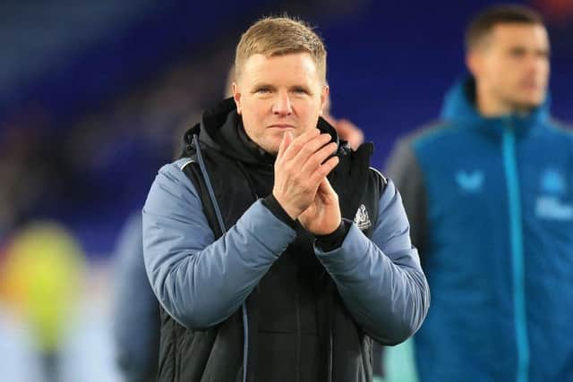 Newcastle United head coach Eddie Howe applauds fans.