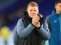 Newcastle United head coach Eddie Howe applauds fans.