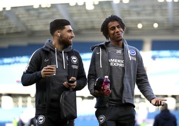 BRIGHTON, ENGLAND - FEBRUARY 08: Alireza Jahanbakhsh and Bernardo Fernandes da Silva of Brighton and Hove Albion speak during a pitch inspection prior to the Premier League match between Brighton & Hove Albion and Watford FC at American Express Community Stadium on February 08, 2020 in Brighton, United Kingdom. (Photo by Bryn Lennon/Getty Images)