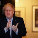 Boris Johnson takes part in the national clap for care workers shortly before being taken into hospital