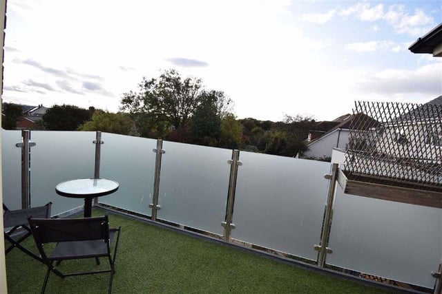 The balcony overlooks the rear gardens.