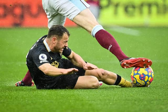 Newcastle United's Scottish midfielder Ryan Fraser (C) fights for the ball with West Ham United's English midfielder Declan Rice during the English Premier League football match between West Ham and Newcastle United at the London Stadium, in London on February 19, 2022.(Photo by JUSTIN TALLIS/AFP via Getty Images)