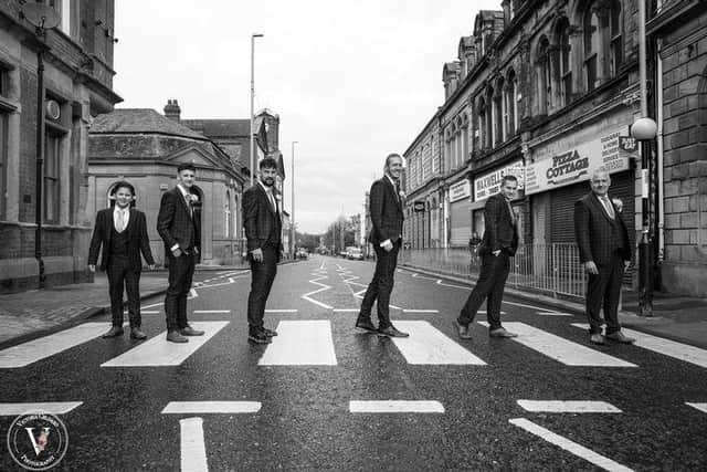 Groom Gary Docherty and his groomsmen also recreated the iconic Beatles image. Photo by Victoria Geldard.