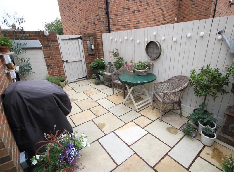 The Indian Sandstone paved patio terrace area is ideal for outdoor entertaining.