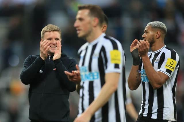 Newcastle United's English head coach Eddie Howe (L) applauds supporters on the pitch after the English Premier League football match between Newcastle United and Aston Villa at St James' Park in Newcastle-upon-Tyne, north east England on October 29, 2022. (Photo by LINDSEY PARNABY/AFP via Getty Images)