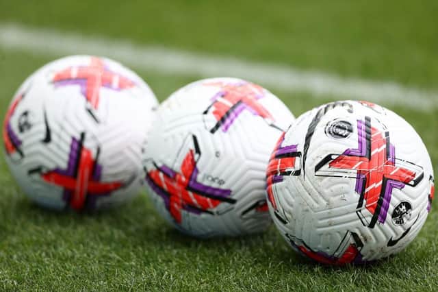 A detailed view of the Nike Flight Aerowsculpt Hi-Vis Premier League match ball prior to the Premier League match between Newcastle United and Wolverhampton Wanderers at St. James Park on March 12, 2023 in Newcastle upon Tyne, England. (Photo by Naomi Baker/Getty Images)
