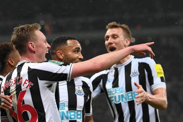 Newcastle United's Sean Longstaff, left, celebrates his second Carabao Cup goal against Southampton with Dan Burn.