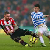 SUNDERLAND, ENGLAND - FEBRUARY 10:  Connor Wickham of Sunderland and Joey Barton of QPR battle for the ball during the Barclays Premier League match between Sunderland and Queens Park Rangers at Stadium of Light on February 10, 2015 in Sunderland, England.  (Photo by Alex Livesey/Getty Images)