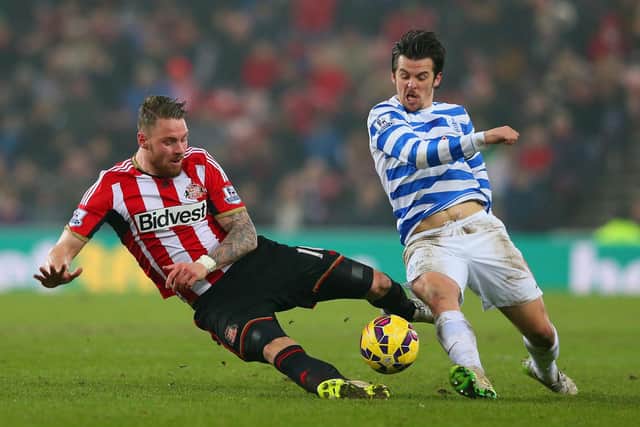 SUNDERLAND, ENGLAND - FEBRUARY 10: Connor Wickham of Sunderland and Joey Barton of QPR battle for the ball during the Barclays Premier League match between Sunderland and Queens Park Rangers at Stadium of Light on February 10, 2015 in Sunderland, England. (Photo by Alex Livesey/Getty Images)