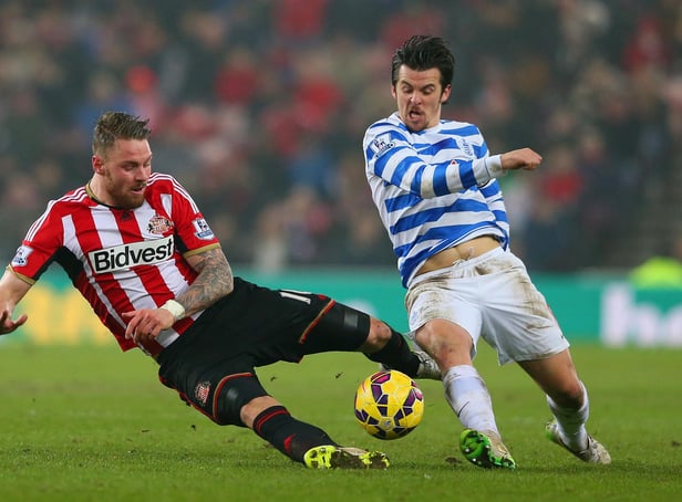 SUNDERLAND, ENGLAND - FEBRUARY 10:  Connor Wickham of Sunderland and Joey Barton of QPR battle for the ball during the Barclays Premier League match between Sunderland and Queens Park Rangers at Stadium of Light on February 10, 2015 in Sunderland, England.  (Photo by Alex Livesey/Getty Images)